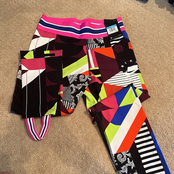 Nike NWT leggings size medium. Super fun and vibrant. - Picture 2 of 12